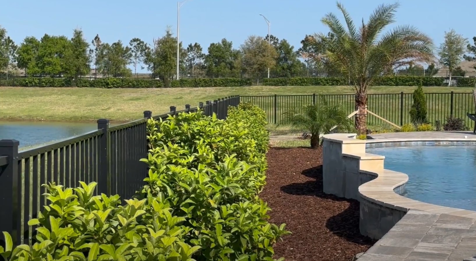 Complete landscaping services including pool area design and professional lawn care in Santa Ana