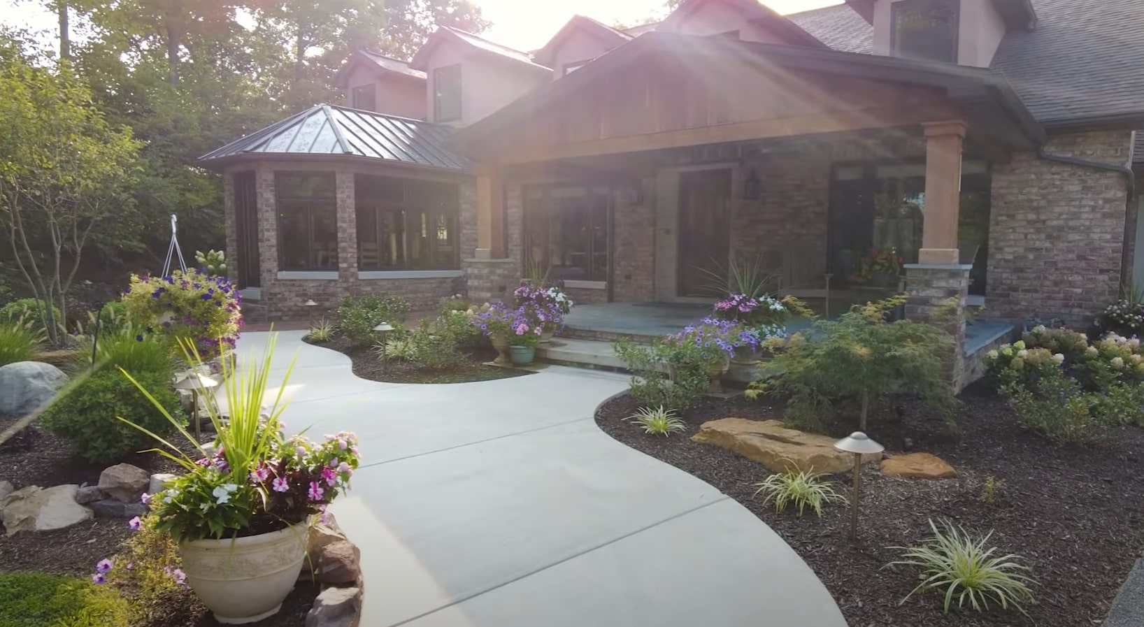 Professional landscape design featuring beautiful stone pathways and lush garden beds in Santa Ana