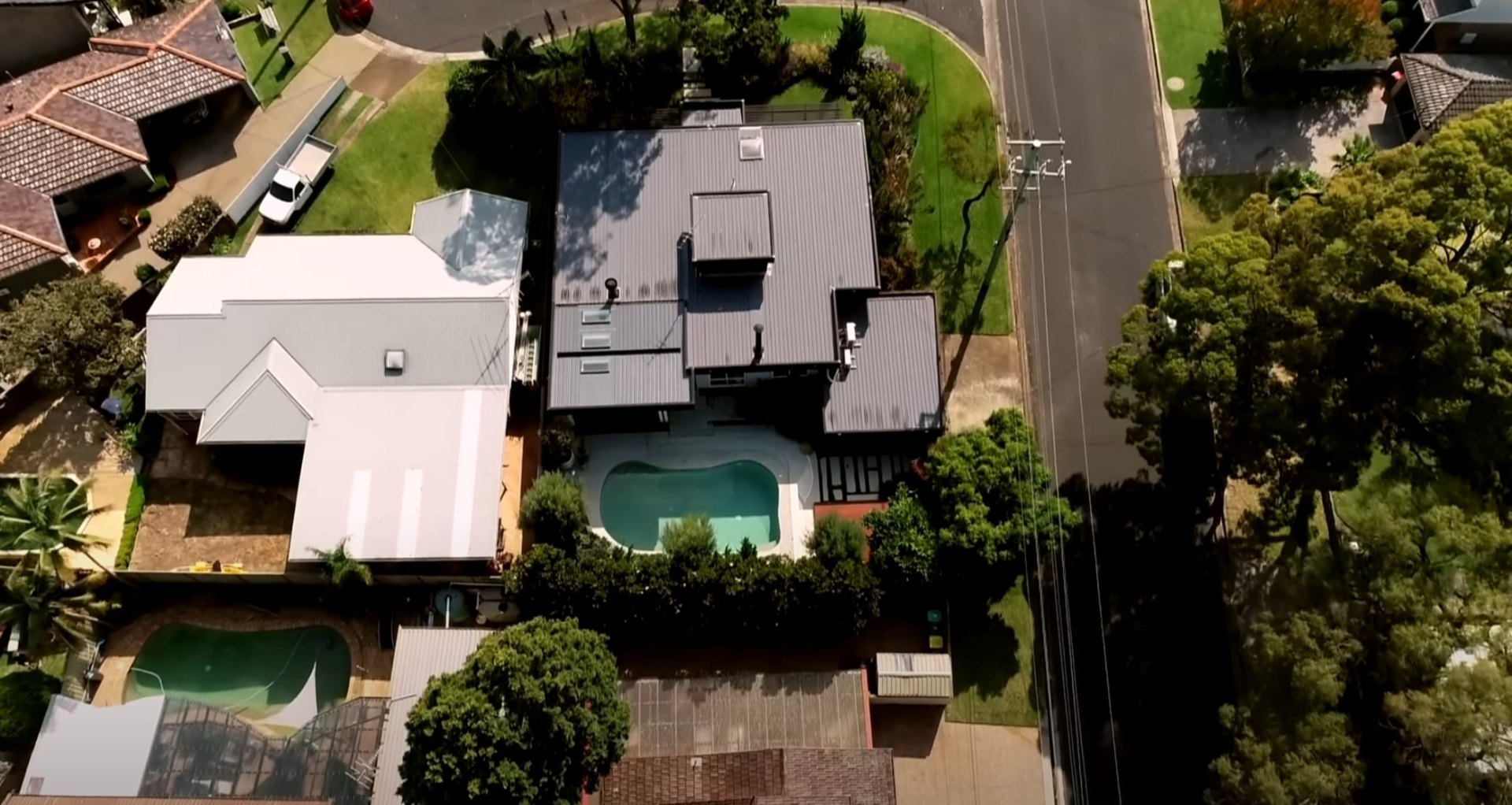 Aerial view of completed residential landscaping project showing professional design and installation